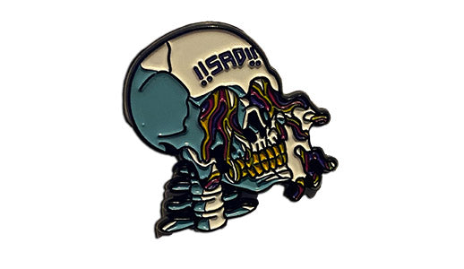 sad skull soft enamel pin